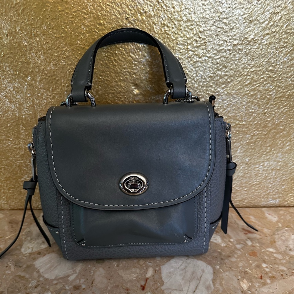 Cute Coach gray mini-backpack!  Pebble and smooth leather. Excellent condition.